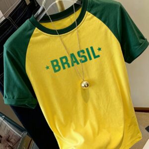 brazil themed printed t shirt with eye catching letter design, a comfortable summer casual top for women. creative color blocked women's t shirt with jersey and soccer uniform design, breathable and not stuffy, suitable for home, outings