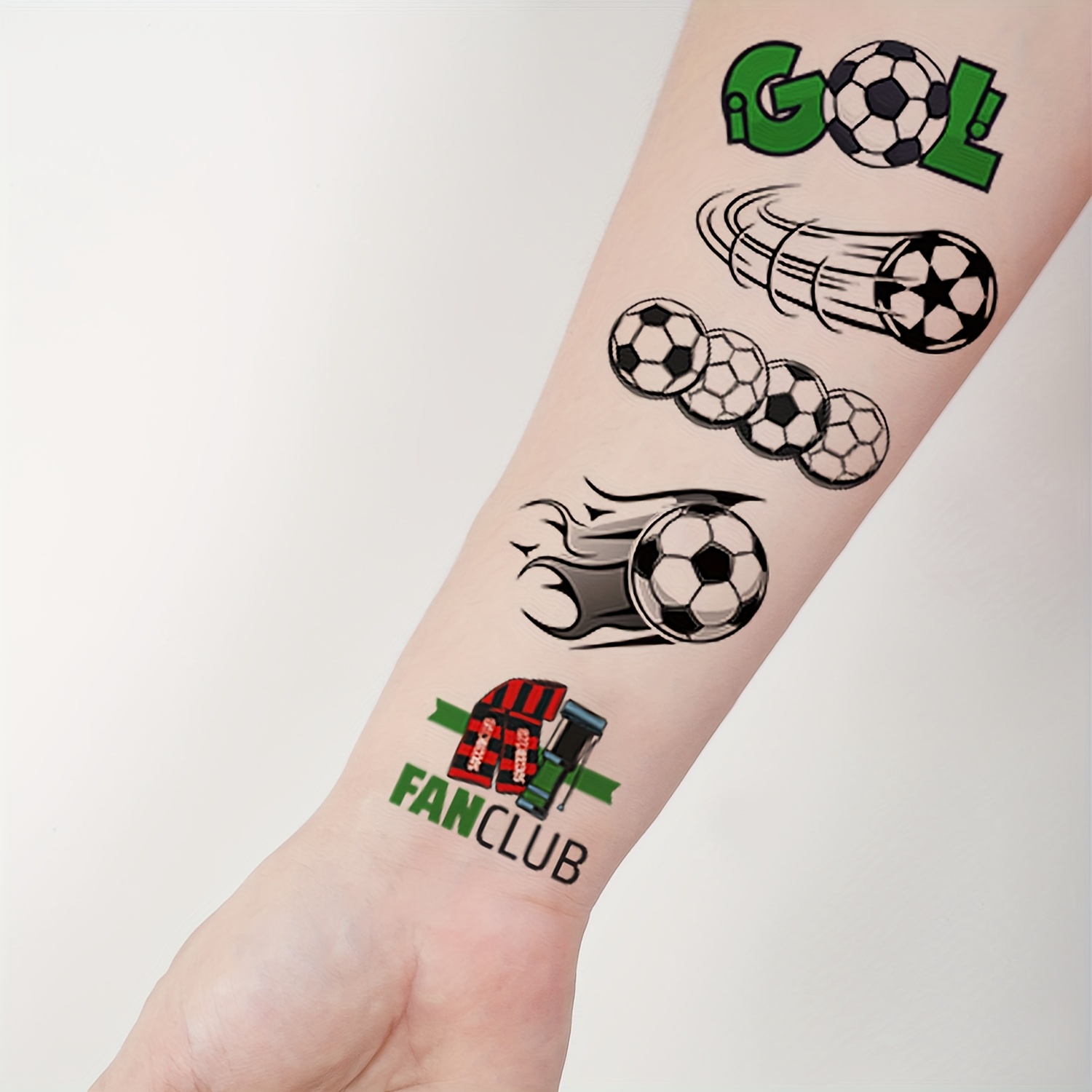 12 sheets with 112 designs of football tattoo stickers, featuring fun cartoon football elements. temporary body, arm, and face makeup fake tattoos suitable for football fans 12 sheets with 112 designs of football tattoo stickers, featuring fun cartoon football elements. temporary body, arm, and face makeup fake tattoos suitable for football fans